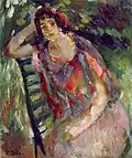 Femme assise dans un jardin