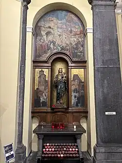 La Vierge du pont des Arches devant le triptyque du même nom peint par Alfred Martin, 1926 (photographie de novembre 2024), Liège, collégiale Saint-Denis.