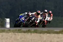 Description de l'image Àlex Crivillé, Nobuatsu Aoki, Sete Gibernau and Jeremy McWilliams 2000.jpeg.