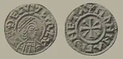 Reproduction des deux faces d'une pièce de monnaie, avec un visage de profil d'un côté et un motif de l'autre côté, tous deux entourés de lettres capitales