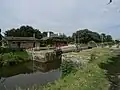 L'écluse du Moulin du Comte au nord du quartier