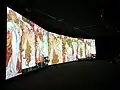 Écrans de l'exposition sur Mucha, Muse Immersif, Banque de France, Maubeuge