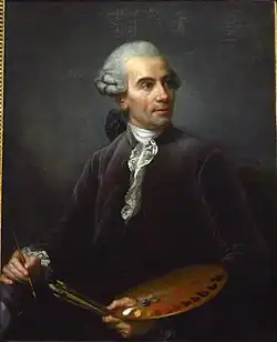 Joseph Vernet, perruque blanche, palette rouge de peinture avec de nombreux coloris, dans la main gauche posée sur l'avant-bras gauche tient plusieurs pinceaux et tient aussi un pinceau dans la main droite, veste foncée, jabot dentelle blanche, en buste ; le personnage regarde vers la droite ; on perçoit une jambe sur la gauche, ce qui laisse penser que le personnage est assis. Une partie du cadre doré du tableau apparaît à la limite gauche de la photographie.