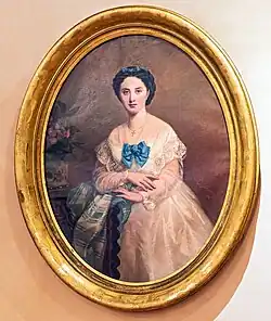 Femme en blanc au nœud bleu (1873), huile sur toile.