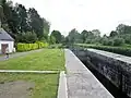 Canal de Nantes à Brest : l'écluse n°179 (la Pie) et le GR 37 (chemin de halage).