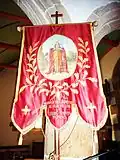 Église paroissiale Saint-Milliau : bannière de procession en l'honneur de saint Milliau