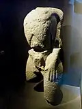 Statue d'un dieu de la fécondité en kersantite provenant de la chapelle de La Fontaine-Banche en Plougastel-Daoulas.