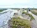 Le GR 34 à Penhors : érosion des dunes et muret de soutènement (ouvrage de protection).