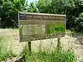 La "zone naturelle protégée" de Pont Dourdu, aménagée à l'emplacement de l'ancienne décharge municipale fermée en 1990 (site réhabilité en 2013).
