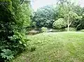 Étang dans le parc du château de Kervoazec.