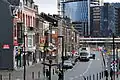 La rue en 2012 avec la tour Paradis en construction.