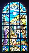 Milizac : église Saint-Pierre, vitrail de la Nativité.