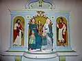 Retable en bois polychrome représentant sainte Anne, la Vierge et l'Enfant Jésus accompagnés de saint Joseph et de saint Joachim.