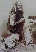 Mendiant de Briec à la fin du XIXe&nbsp;siècle (photographie de Joseph Villard, Musée départemental breton).