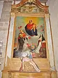 L'église paroissiale Saint-Pierre, piétà et retable.