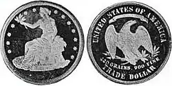Revers et avers d'une pièce de monnaie. Une femme assise avec un rameau d'olivier dans sa main droite d'un côté, un aigle à tête blanche de l'autre.