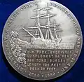 L'Endeavour au revers de la médaille d'argent commémorative de James Berry du jubilé des 200 ans de la redécouverte de la Nouvelle-Zélande en 1769.