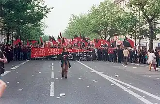 Photographie d'un cortège de la Confédération nationale du travail.