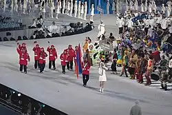 Photographie de l'entrée de la délégation arménienne lors de la cérémonie d'ouverture.
