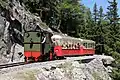 La locomotive à vapeur Lieseli du petit train panoramique d'Émosson arrivant au croisement no 1.