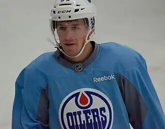 Photographie couleur d'un joueur de hockey sur glace