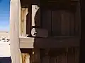 Mécanisme de fermeture de la porte principale en position ouverte