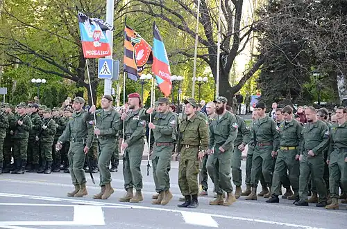 En 2015 avec le drapeau de l'unité