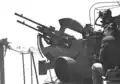 L'akan suédois m/38 de 20&nbsp;mm (20/65 Breda en montage double naval) sur le navire de construction italienne HSwMS Remus (28).
