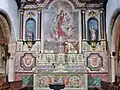 Église Notre-Dame de Larmor-Plage : le retable de la Vierge à l'Enfant. On distingue les blasons de Louis II de Rohan-Guéméné (1444-1508) et de son épouse Louise de Rieux (née le 1er mars 1446).