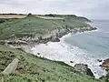 Le GR 34 et les falaises en direction de la Pointe de Kerivoal (visible à l'arrière-plan) vus depuis la falaise située à l'est de Pors Lesven.