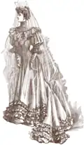 Tenue de mariée avec un long voile en mousseline transparente (1906).