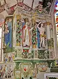 Chapelle Saint-Sébastien de Saint-Ségal : le retable du chœur (vue partielle, statues de saint Fabien et saint Sébastien).