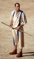 Arbitre et son bâton de séparation