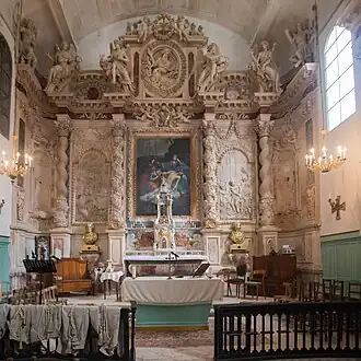 Maître autel et tabernacle à ailes.