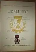 Certificat et insigne d'activiste, 1961.