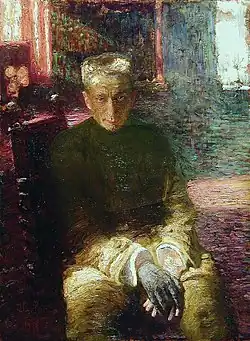 Portrait d'un homme assis, taciturne, sur un fond très coloré.