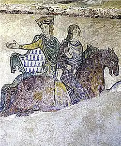 Fresque endommagée représentant deux femmes à cheval