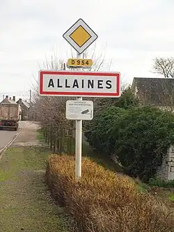 Panneau d'agglomération sur la D954.