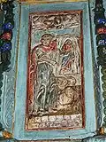 Détail de la chaire : Saint-Luc avec le taureau et le portrait de la Vierge.