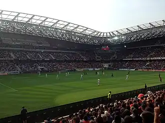 Vue du stade de L'Allianz Arena depuis une tribune en bas.