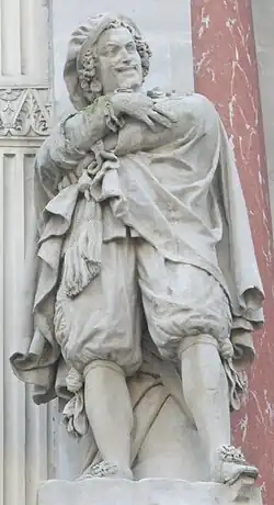 La Comédie, œuvre d'Amédée Doublemard ornant le côté gauche de la façade.