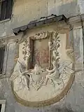 Fesque d'une annonciation sur les murs d'une maison