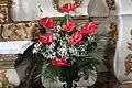 Bouquet de 7 fleurs d'Anthurium dans l'église de Cinfaes, Portugal.
