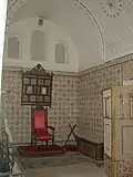 Pièces meublées du type de la fin du XIXe&nbsp;siècle avec fauteuil et paravent.