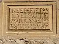 L'église, l'inscription de réédification.