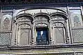 Art work on outer walls of palace of Kuthar