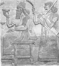 Assurnasirpal II sur son trône, accompagné d'un serviteur (sans doute un eunuque). Copie d'un bas-relief du palais nord-ouest.