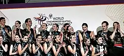 L'équipe française Les Atlantides au "kiss and cry" aux championnats du monde 2011