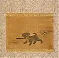 Un chiot qui joue avec une plume de faisan. Peinture sur soie montée en rouleau attribuée à Yi Am. 31 x 43 cm. Philadelphia Museum of Art