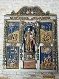 Le retable en bois.